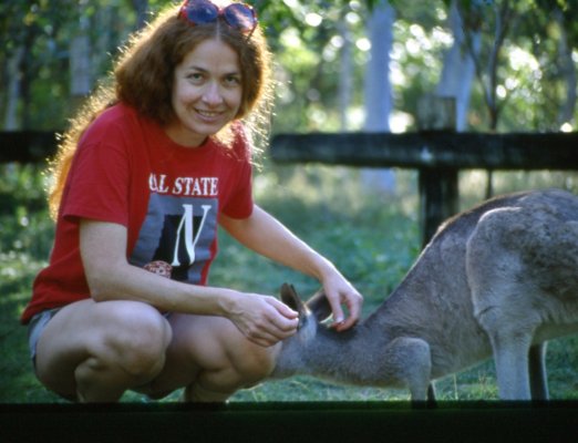 Joanne petting a kangaroo at camp.jpg