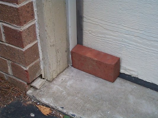 gar door hole brick.JPG