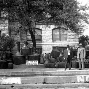 Confiscated stills in front of the courthouse - Circa 1920
