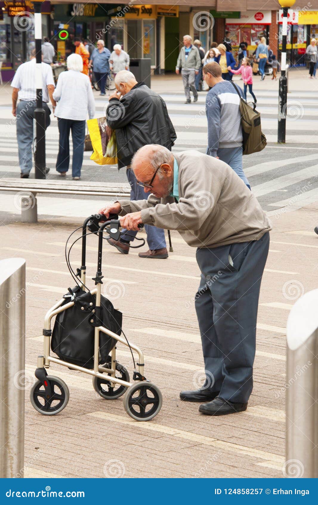 corby-united-kingdom-august-old-man-using-mobility-aid-standing-walking-basing-walker-conceptual-togetherness-h-124858257.jpg