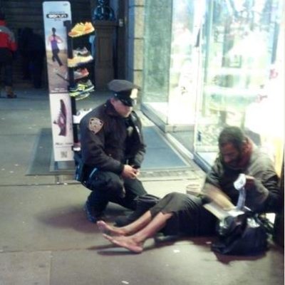 nypd-officer-gives-homeless-man-boots.jpg