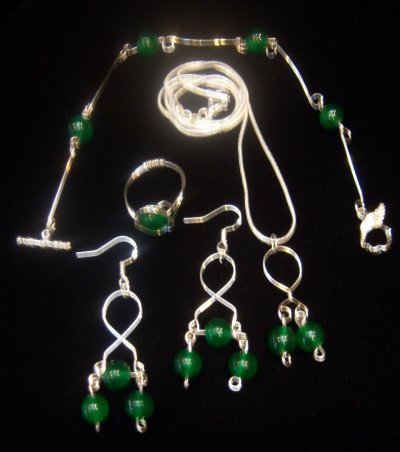 Green Natural Emerald .924 Sterling Silver Necklace Earrings Bracelet Ring 6.jpg
