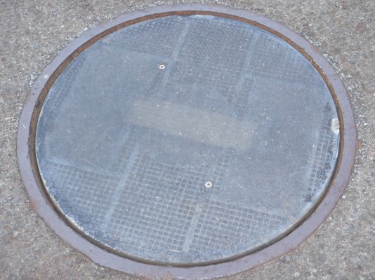 Street sewer alarm manhole cover.JPG