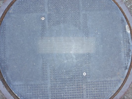 Street sewer alarm with photovoltaic panel across center.JPG