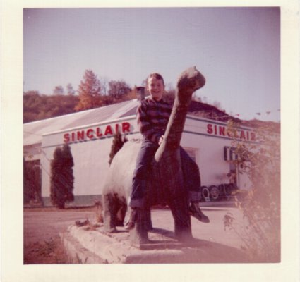 Walt riding the Sinclair dino.jpg