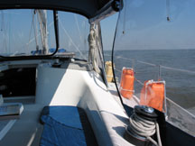 Sailing in the open Gulf. The orange jerry cans are extra diesel.
