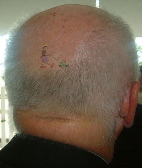 bald guy tattoo
