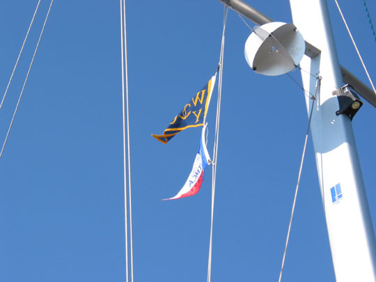 TMCA burgee flying from our flag halyard after landfall in Mobile. The round thingy is our radar reflector.